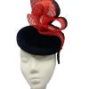 Black beret base headpiece with stunning red crin and black trim detail.